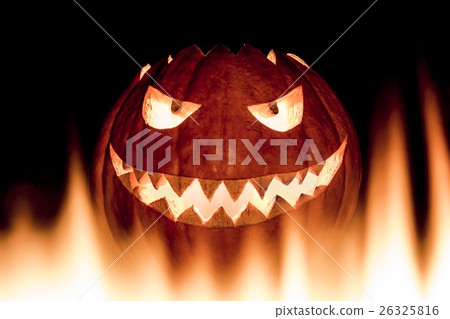 Scary halloween pumpkin in burning fire flames 26325816