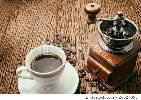 Cup of coffee with coffee maker on white Cup of coffee with coffee maker on white 26327355