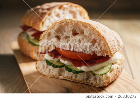 italian sandwich with speck and mozzarella 26330272