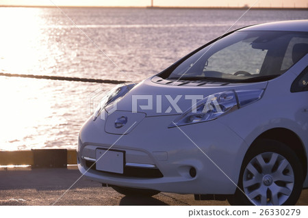 Morning glow and electric car 26330279