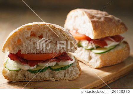 italian sandwich with speck and mozzarella 26330280