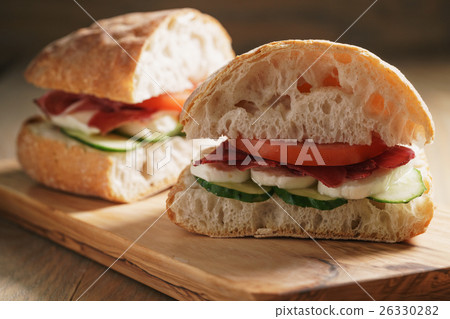 italian sandwich with speck and mozzarella 26330282