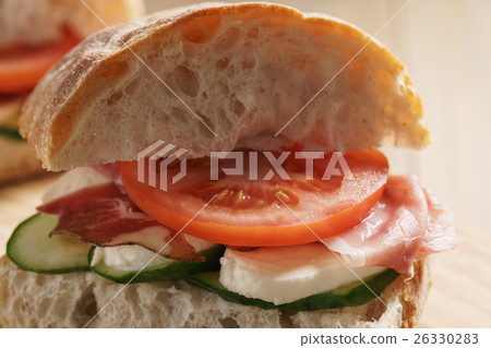 italian sandwich with speck and mozzarella 26330283