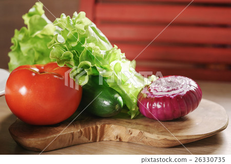raw vegetables on kitchen table raw vegetables on kitchen table 26330735