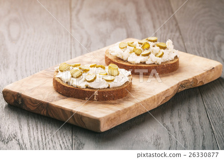 sandwiches with rye bread, cream cheese and 26330877