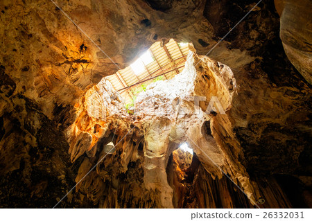 Large cavity limestone cave sunlight shine Large cavity limestone cave sunlight shine 26332031