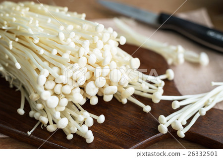 Enoki mushroom on old wooden table 26332501