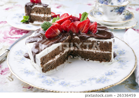 Choco Nuts Cake with Strawberries on Plate 26336459