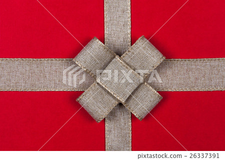Ribbon on a red background Christmas gift 26337391