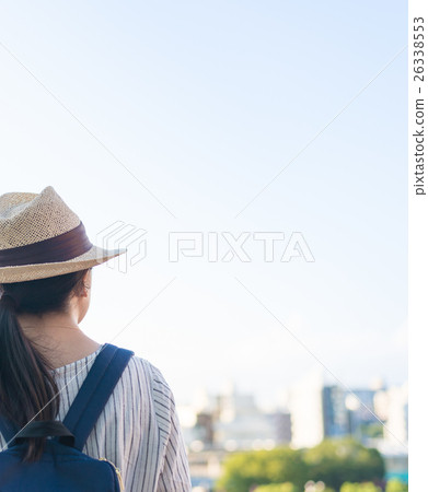 A woman walking A woman walking 26338553