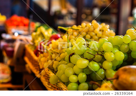Ripe bunche of grapes in wicker boxes.  26339164