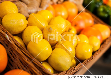 Fresh lemons in wicker boxes. Fresh lemons in wicker boxes. 26339165