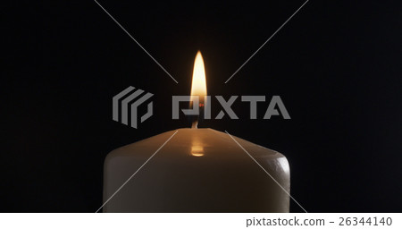 one burning candle, isolated on black 26344140