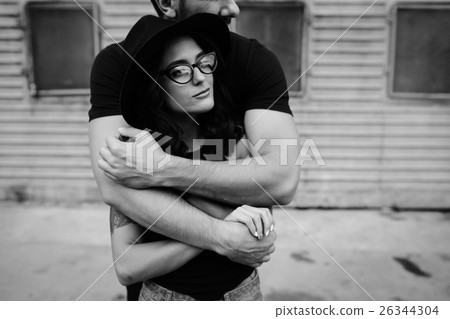 guy hugging his girlfriend from behind 26344304