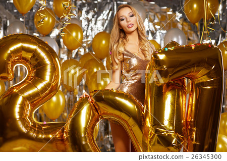Beauty woman in gold dress Beauty woman in gold dress 26345300