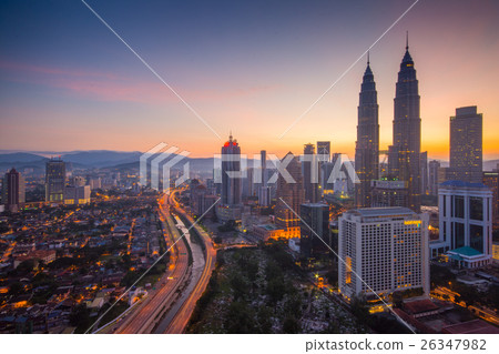 Kuala Lumpur city skyline during sunrise Kuala Lumpur city skyline during sunrise 26347982