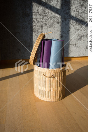 Yoga mat in the basket 26347987