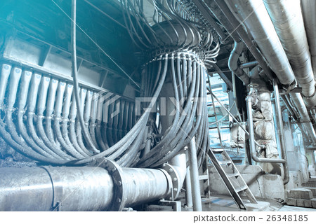 Steel pipelines and cables in blue tones 26348185