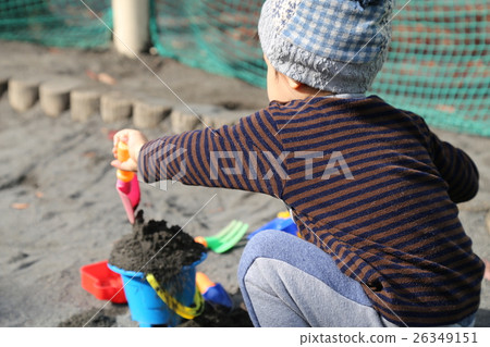 Infants playing in the sandbox 26349151