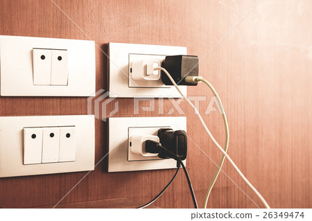 Plug the battery charger. Plug the battery charger. 26349474