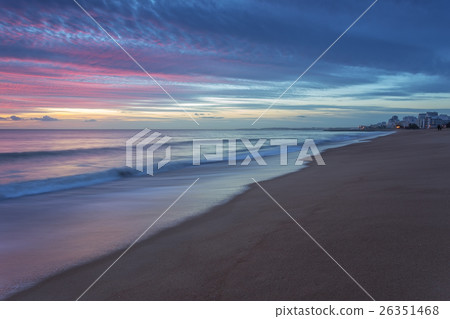Pink sunset on the beach in Quarteira. Pink sunset on the beach in Quarteira. 26351468