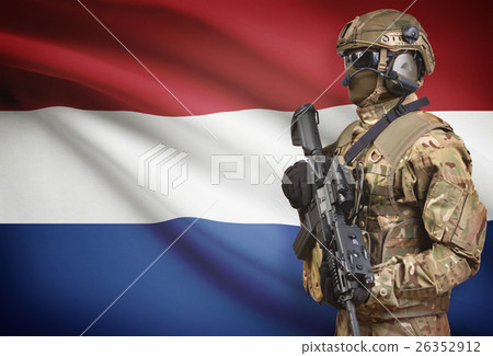 Soldier with flag on background - Netherlands Soldier with flag on background - Netherlands 26352912