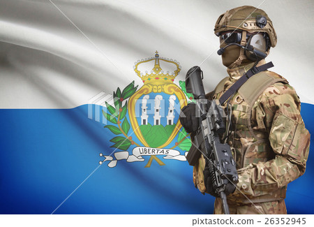 图库照片: soldier with flag on background - san marino