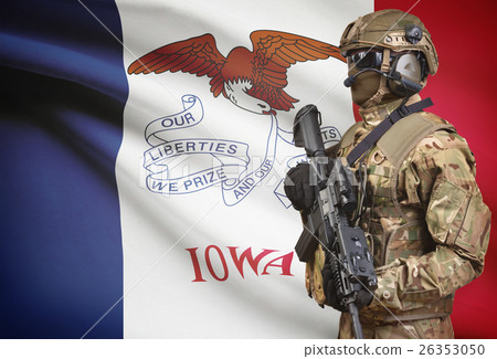 Soldier in helmet holding machine gun with USA state flag on background series - Iowa Soldier in helmet holding machine gun with USA state flag on background series - Iowa 26353050