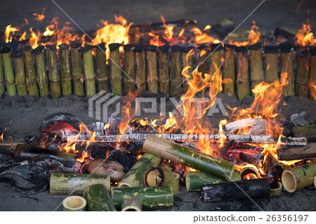 Burning bamboo rice in traditional cooking 26356197