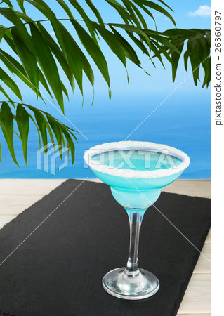 Blue cocktail on the tropical beach 26360797