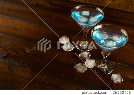 Blue cocktail with ice, copy space 26360798