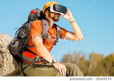 Successful young man, using virtual reality 26364574