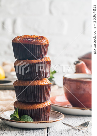 Freshly baked orange muffin Freshly baked orange muffin 26364812