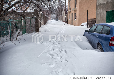 Snow storm hits city. street after blizzard Snow storm hits city. street after blizzard 26366083