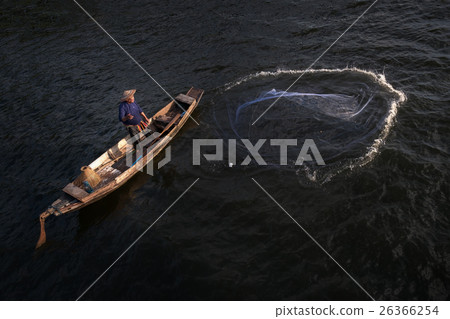 Asian fisherman on wooden boat casting net Asian fisherman on wooden boat casting net 26366254