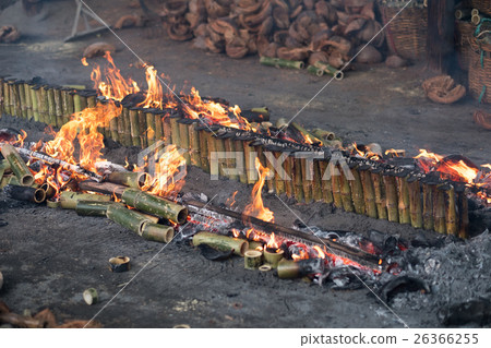 Burning bamboo rice in traditional cooking Burning bamboo rice in traditional cooking 26366255