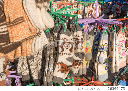 Bunch of handmade colorful woolen socks 26366475