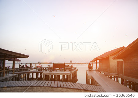 houses on piles on water at the time sunset houses on piles on water at the time sunset 26366546