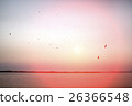 houses on piles on water at the time sunset 26366548