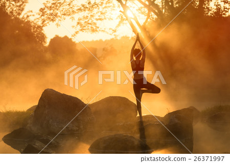 Asian young woman practicing yoga Asian young woman practicing yoga 26371997