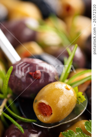 Marinated olives with herbs. Marinated olives with herbs. 26372310