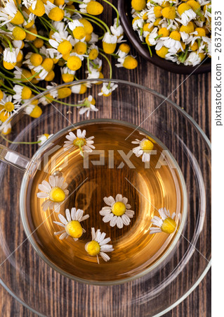 Cup of medicinal chamomile tea 26372853