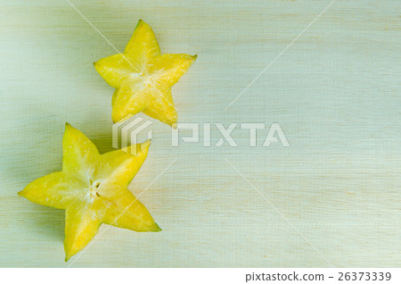 Star apple fruit with half cross section isolated 26373339