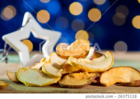 Dry fruit with christmas star on the blue backgrou 26375118