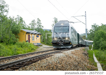 Flamsbana railway train arriving at small rural Flamsbana railway train arriving at small rural 26375537