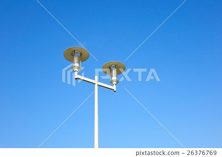 Street Lamp Under The Blue Sky Background 26376769