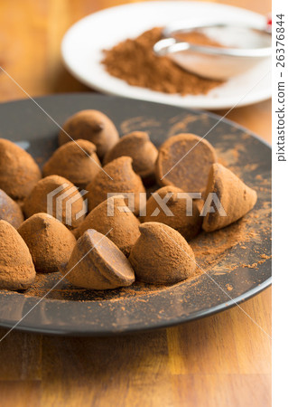 Sweet chocolate truffles and cocoa powder. Sweet chocolate truffles and cocoa powder. 26376844