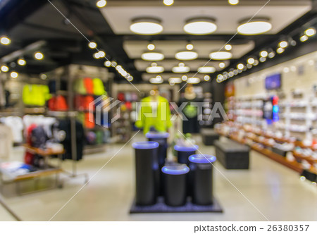 Abstract blurred photo of fashion store in shopping mall which have clothing bag and shoes, shopping concept 26380357