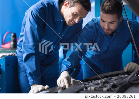 Involved mechanics working on car break out Involved mechanics working on car break out 26385261