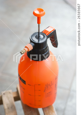 orange water spraying bottle orange water spraying bottle 26385667